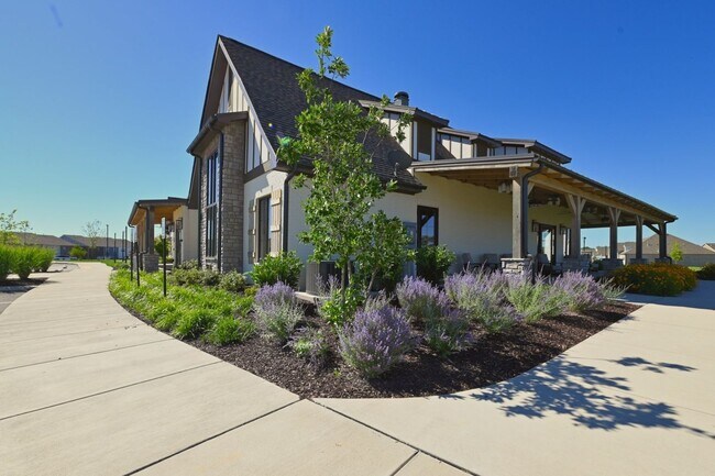 Building Photo - **BE THE LUCKY ONE TO LIVE IN THIS 2024-BUILT END-UNIT TOWNHOME IN A RESORT-STYLE COMMUNITY**