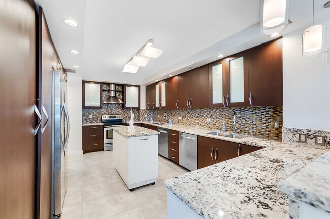 Building Photo - 9801 Collins Ave