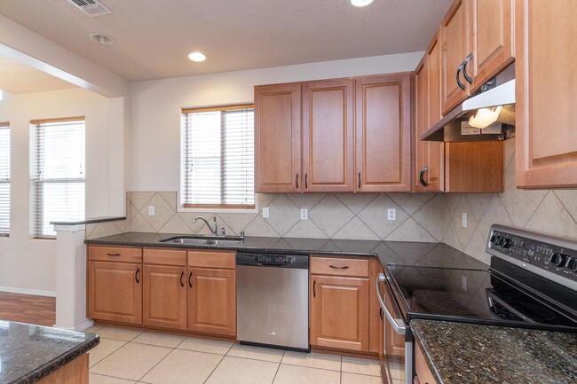 Building Photo - End Unit Townhouse Available Now!