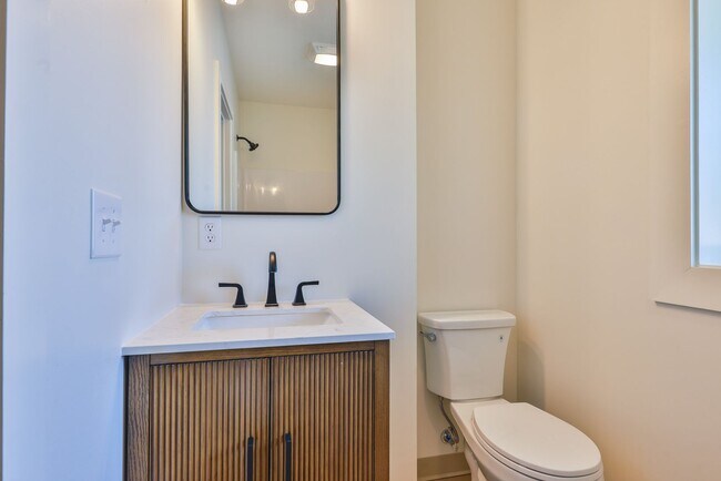 Building Photo - Modern Remodel with Designer Finishes | All Utilities Included