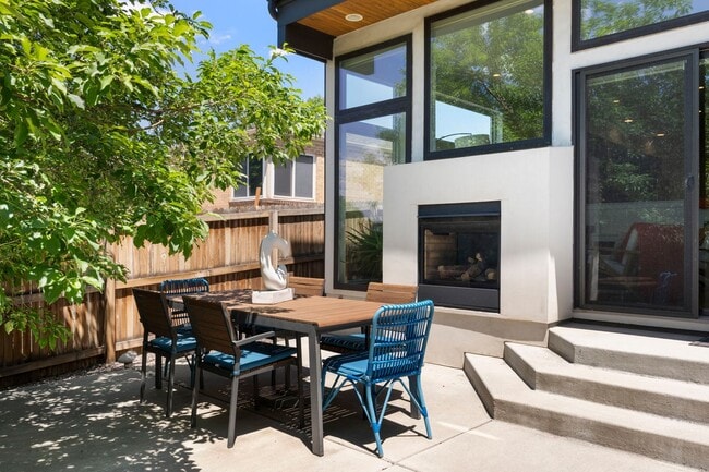 Building Photo - Modern 4BR/3.5BA Duplex with Finished Base...
