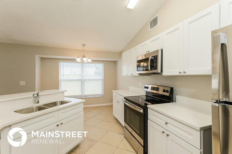 Building Photo - 2704 Champion Ridge Dr