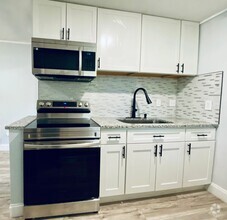 Building Photo - Limited Time Rent Special!!! 2 Bedroom 2 B...