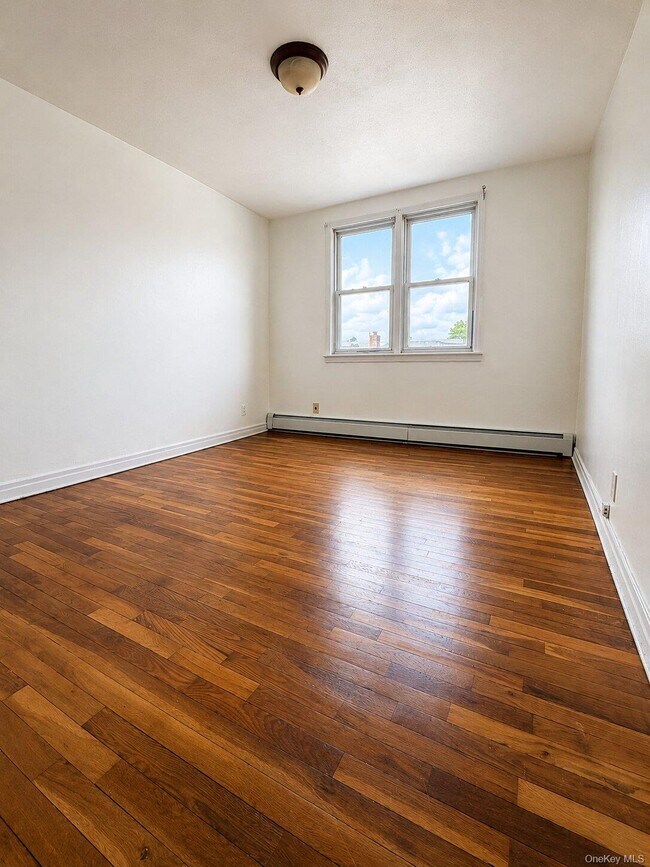 Building Photo - 214-26-214-46 46th Rd