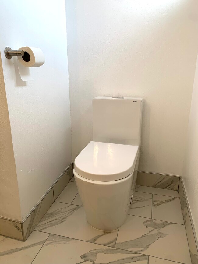 new bathroom fixtures and floors - 11138 Aqua Vista St
