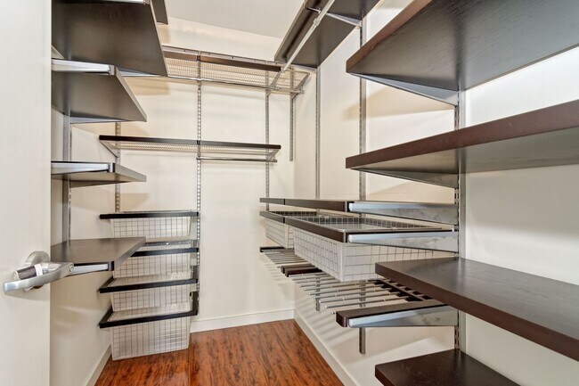Building Photo - Modern Downtown Condo in Premier High-Rise...