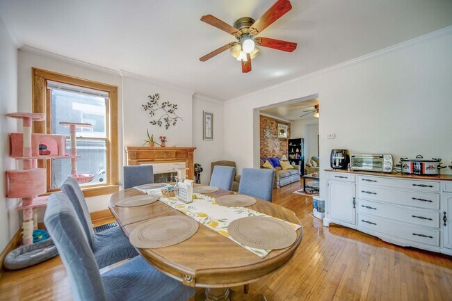 Building Photo - Charming 5-Bedroom Home with Exposed Brick and Modern Upgrades