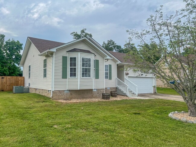Building Photo - Massive Fenced Backyard with a Shed and Ga...