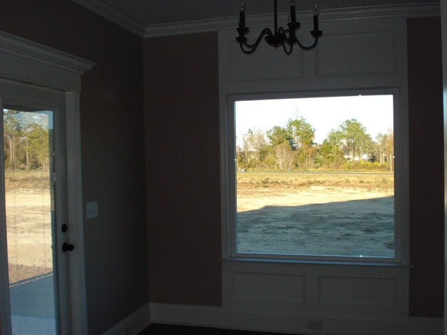 Building Photo - Southern Comfort Living: Elegant 4BR/2BA Home with 3-Car Garage, Close to Moody AFB in Lakeland, GA