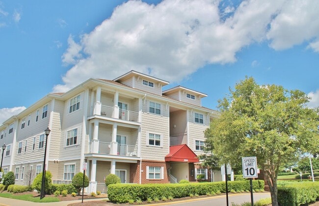 Building Photo - 2 Bedroom Condo w/Open Floor-Plan & Stainless Steel Appliances! Some Utilities Included!