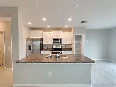 Building Photo - 7412 French Marigold Ave.