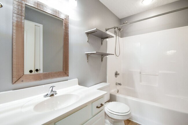 Building Photo - Pet Friendly Three Bedroom with Bonus!