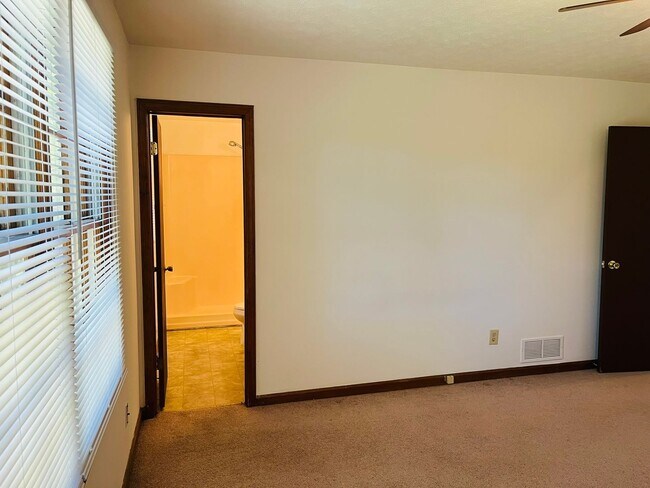 Building Photo - Great location, large wooded and fenced ya...