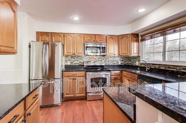 Building Photo - 8417 Meadow Green Way