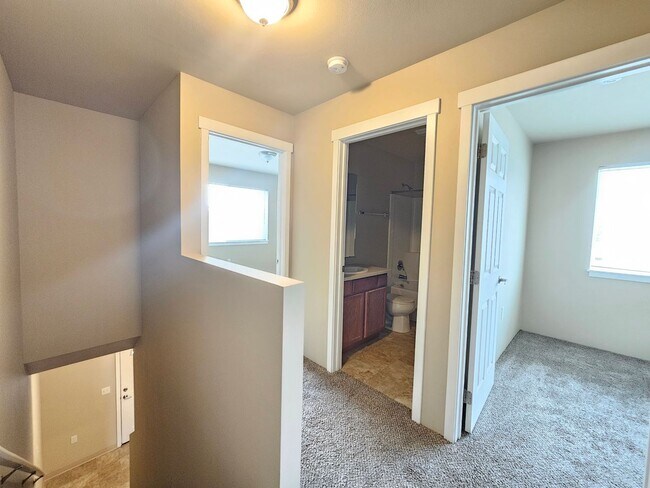 Building Photo - 5207-5207 E Upriver Dr