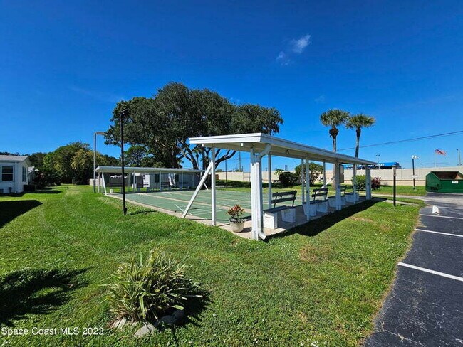 Building Photo - 55+ in Quiet Gated Community
