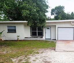 Building Photo - 3 Bedroom 2 Bath with Fenced in Yard