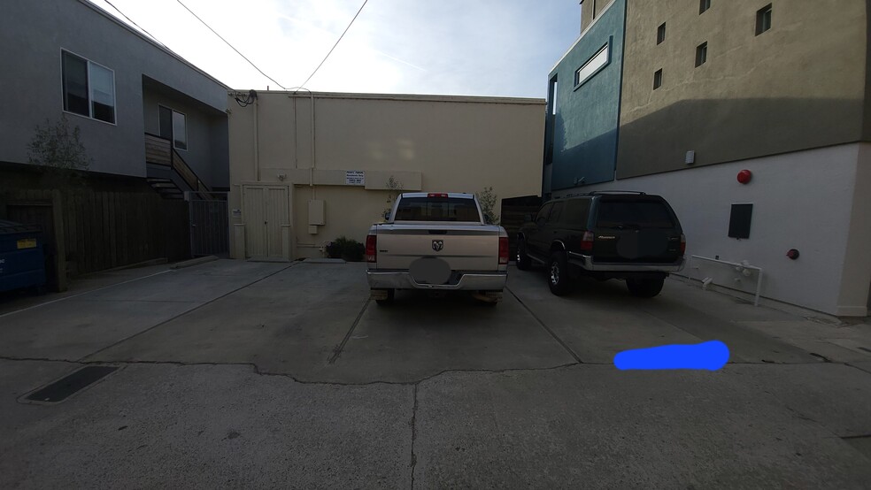 Assigned parking in back of building - 4057 Brant St