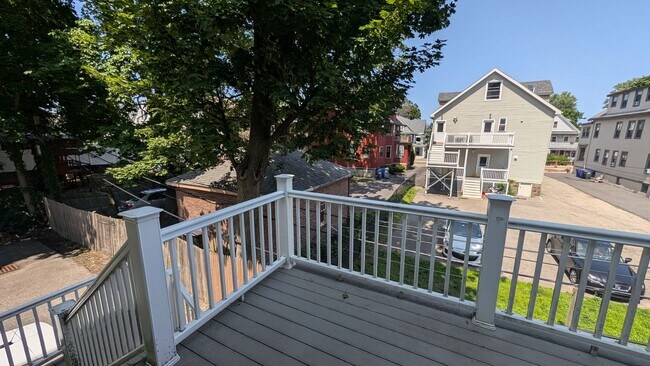 Building Photo - Spacious Townhouse: 4-bed, 3.5 bath unit in Brighton with Garage Parking