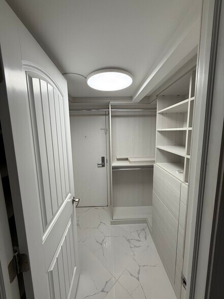 NEW MASTER BD WALK IN CLOSET - 780 NE 69th St