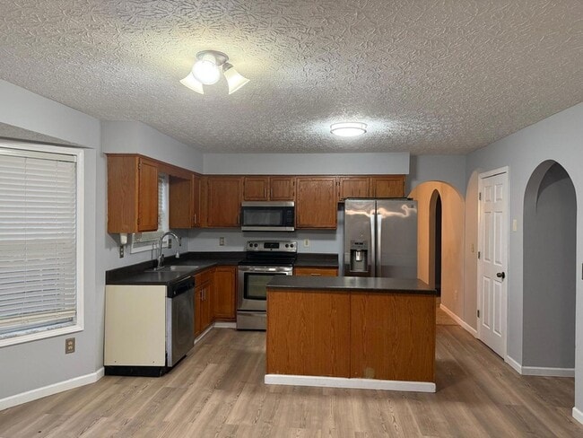 Building Photo - 6729 Kristins Cove Ln