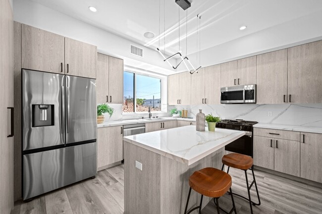 Building Photo - Stunning brand-new 3 Bedroom 4 Bathroom townhouse with private garage and rooftop balcony!