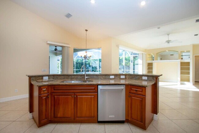 Building Photo - Rarely available executive home in The Hammocks is ready to rent on a long-term lease.