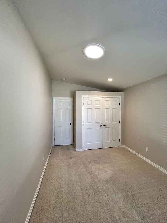 Building Photo - Spacious Duplex with 3-Car Garage & Private Patio!