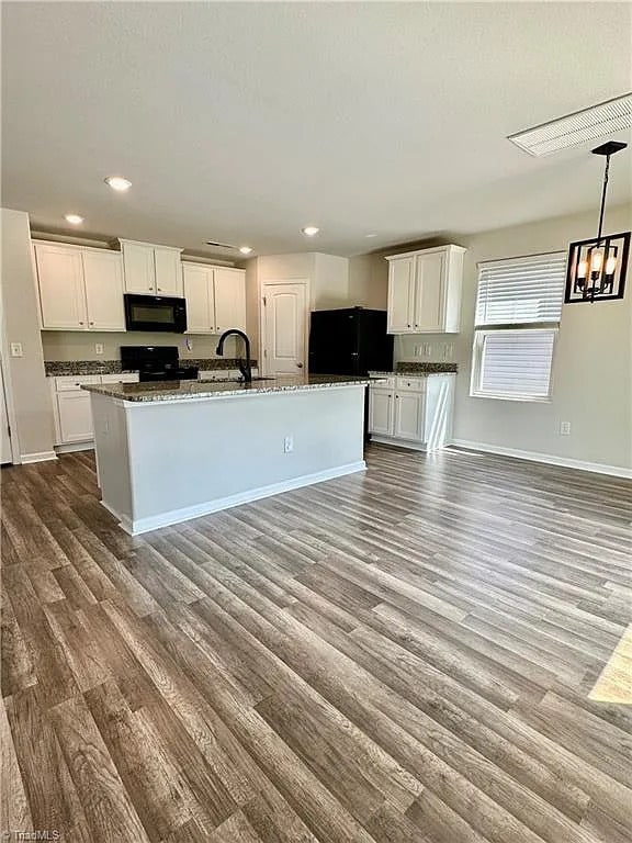 Building Photo - Earn Wealth While Leasing - Like a Homeown...