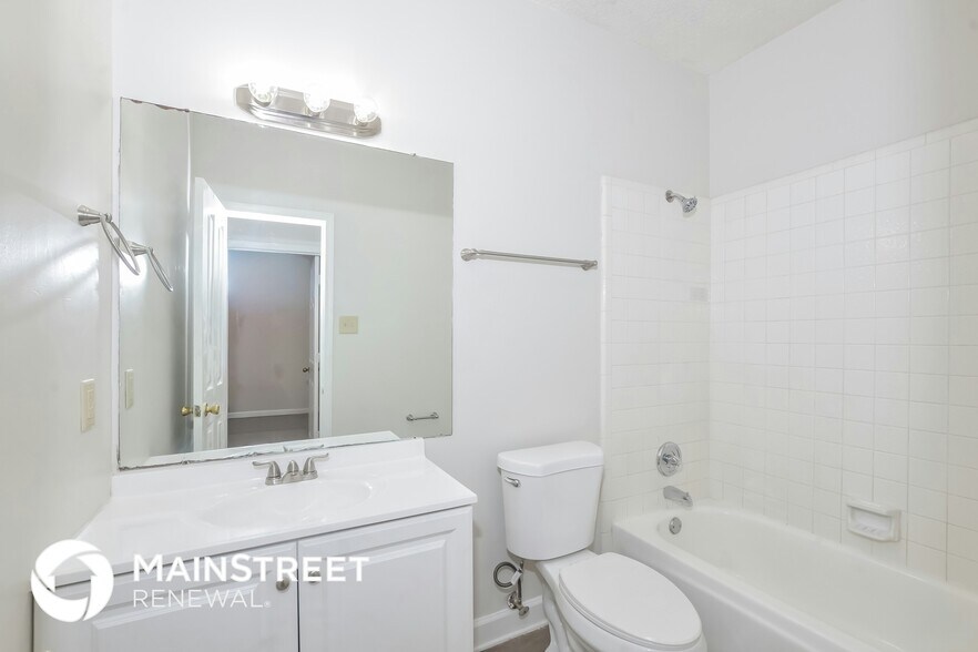 Building Photo - 6650 Spencer Forest Cove W