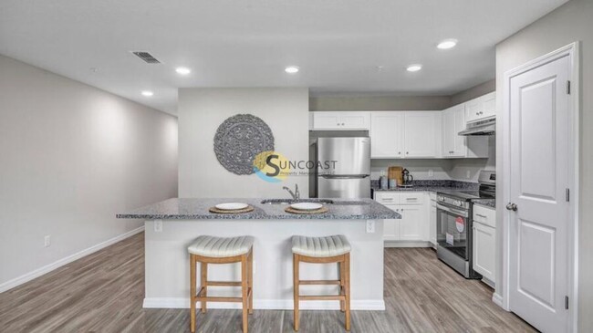 Building Photo - Your New Home Awaits: Stylish 2B/2B Apts w...