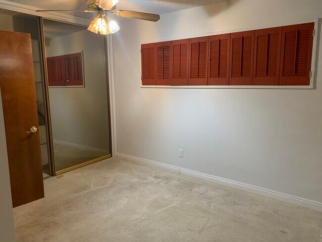Master bedroom with blackout shutters - 1914 W Alameda Ave