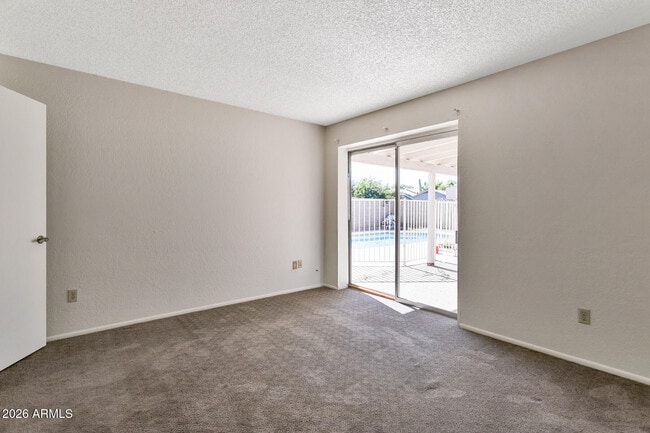 Building Photo - 4415 E Joan De Arc Ave