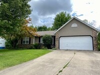 Building Photo - Three Bedroom Home w/ 2.5 Baths and 2 Car ...