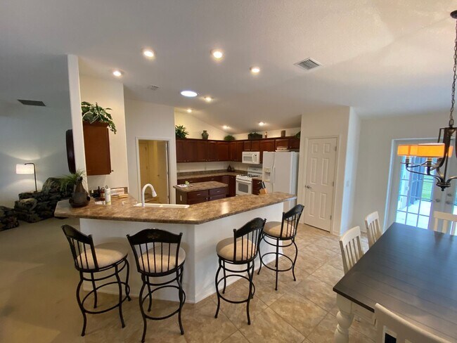 Building Photo - SEASONAL RENTAL. Large 4 Bed + 4 1/2 Baths Home, w/Views of the Jacaranda Golf Course and Lake in...