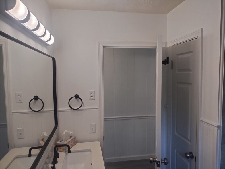 Bathroom with linen closet - 244 Sterling Rd