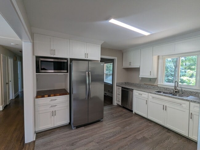 Building Photo - Ranch with Fence and 20x30 Garage/Workshop with Electric Close to Light Rail