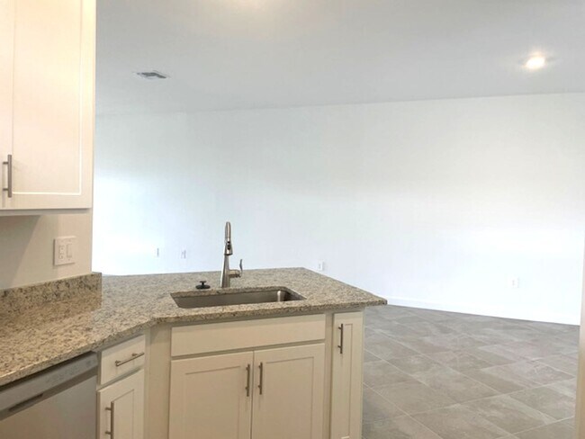 Building Photo - New Construction 2 Bedroom PLUS a Home Office Available in Lorraine Lakes