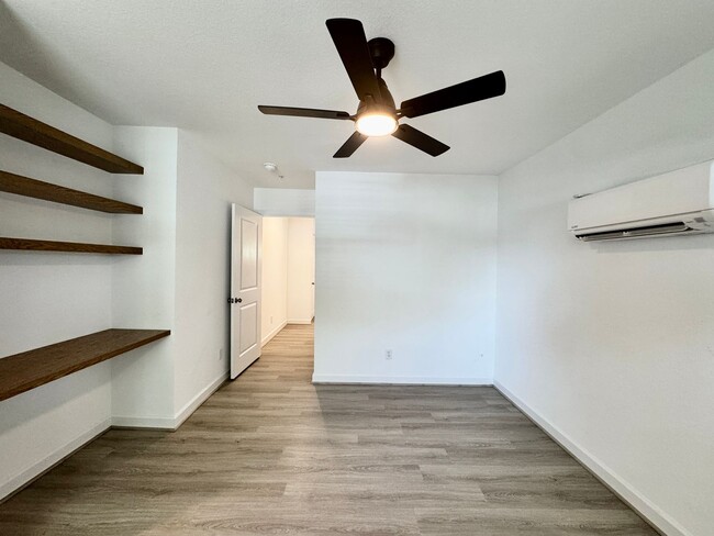 Building Photo - Practically New & Available May 1st! Luxur...