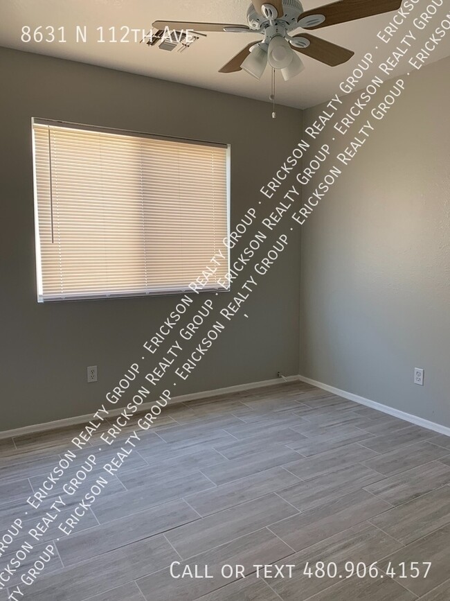 Building Photo - 8631 N 112th Ave