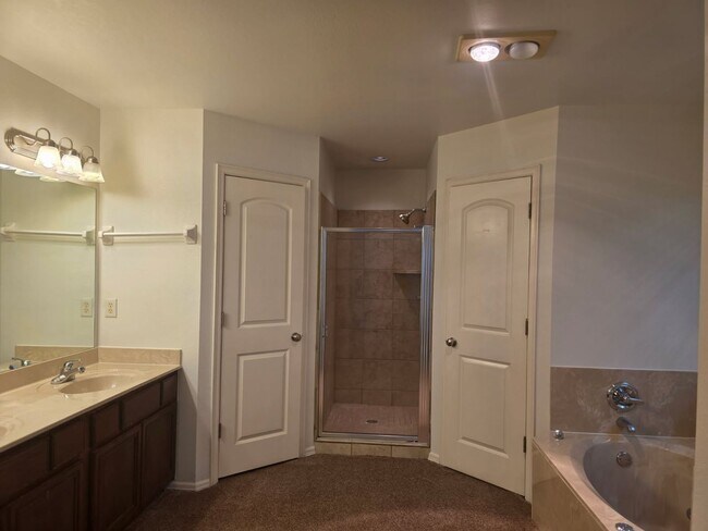Building Photo - Come make this lovely 4 bedroom 2 bath, 2+...