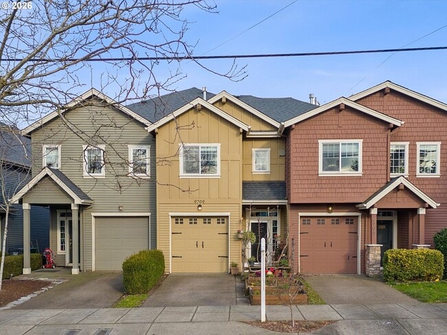 Building Photo - Spacious 3 Bedroom Townhome with Stainless Steel Appliances, Attached Garage & Open Layout