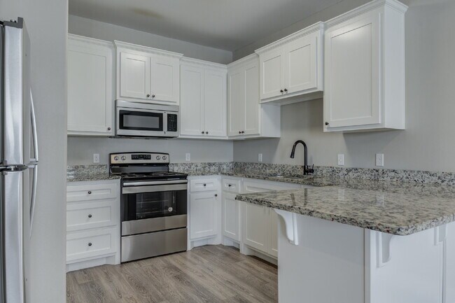 Building Photo - Stunning 3 Story Town-Home near Texas Tech...