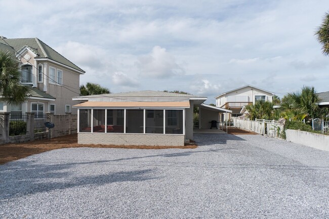 Building Photo - Beautiful Three Bedroom with Private Beach...