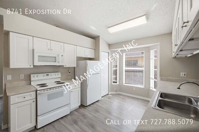 Building Photo - 8741 Exposition Dr