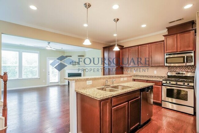 Building Photo - End Unit Townhome | Back Patio With Privac...