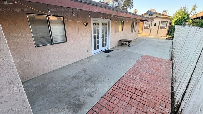 Building Photo - 3 bedroom 2 bathroom home on a corner lot with extra fenced parking.