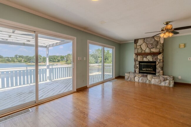 Building Photo - Price Improvement! Lakefront Dream Home – ...