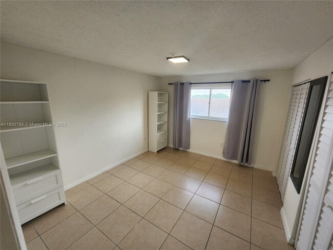 Building Photo - 7905 W 30th Ct