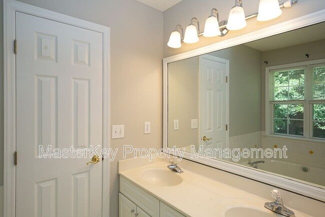 Building Photo - 7916 Strawberry Meadows St
